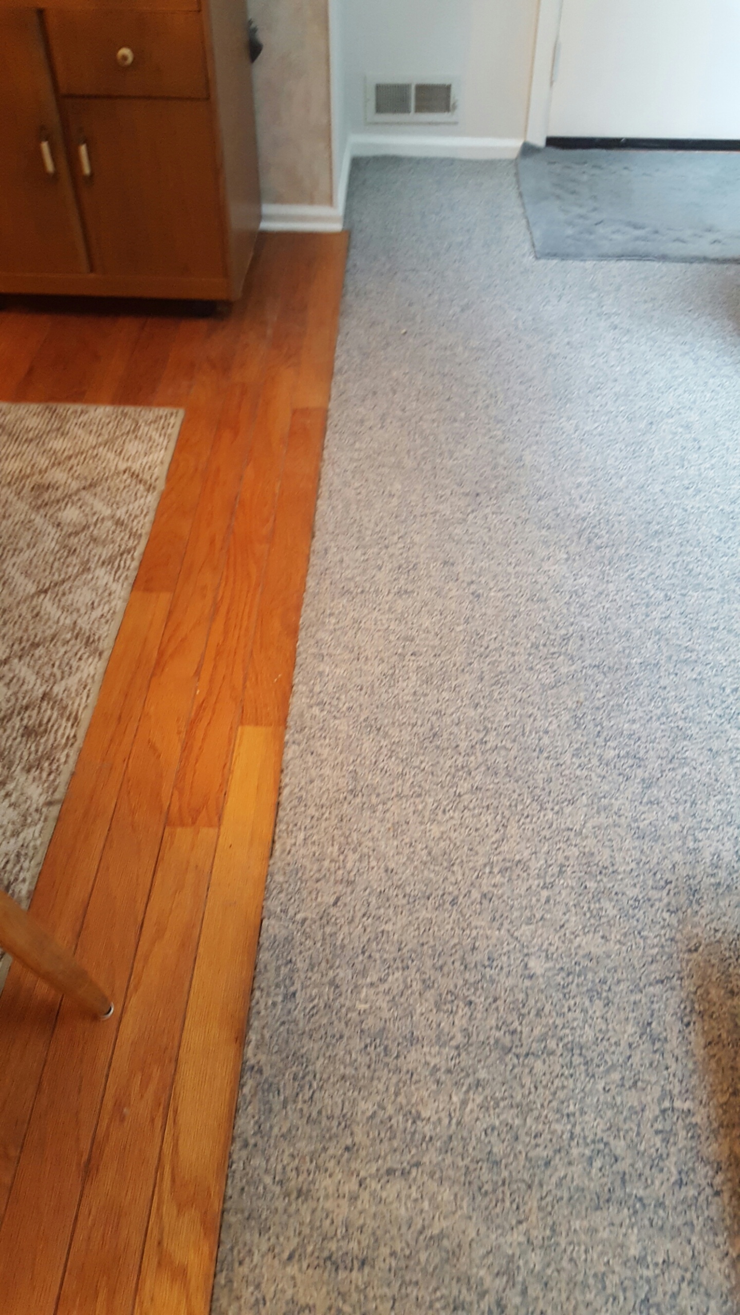 Repaired & Restretched Berber Carpeting on Concrete floor in Egg Harbor